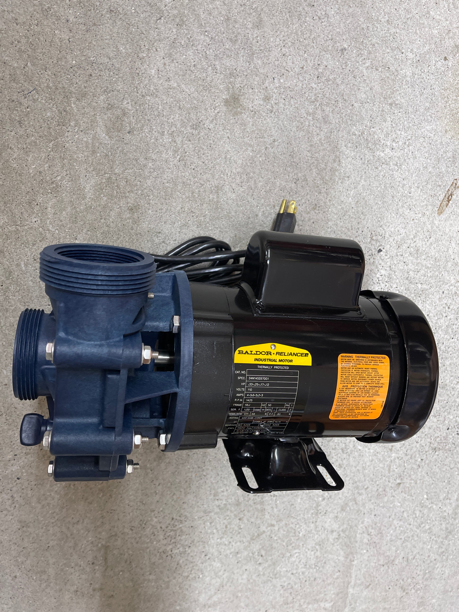 Teton XT Ecostream external pond pump, side view showing the blue polypropylene wet end, threaded intake port and black Baldor motor